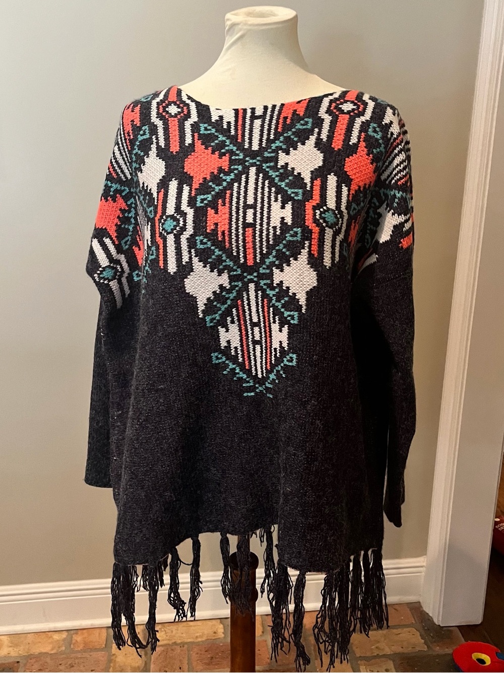 Paper Crane Charcoal Off-Shoulder Fringe Sweater with Coral & Teal Accents